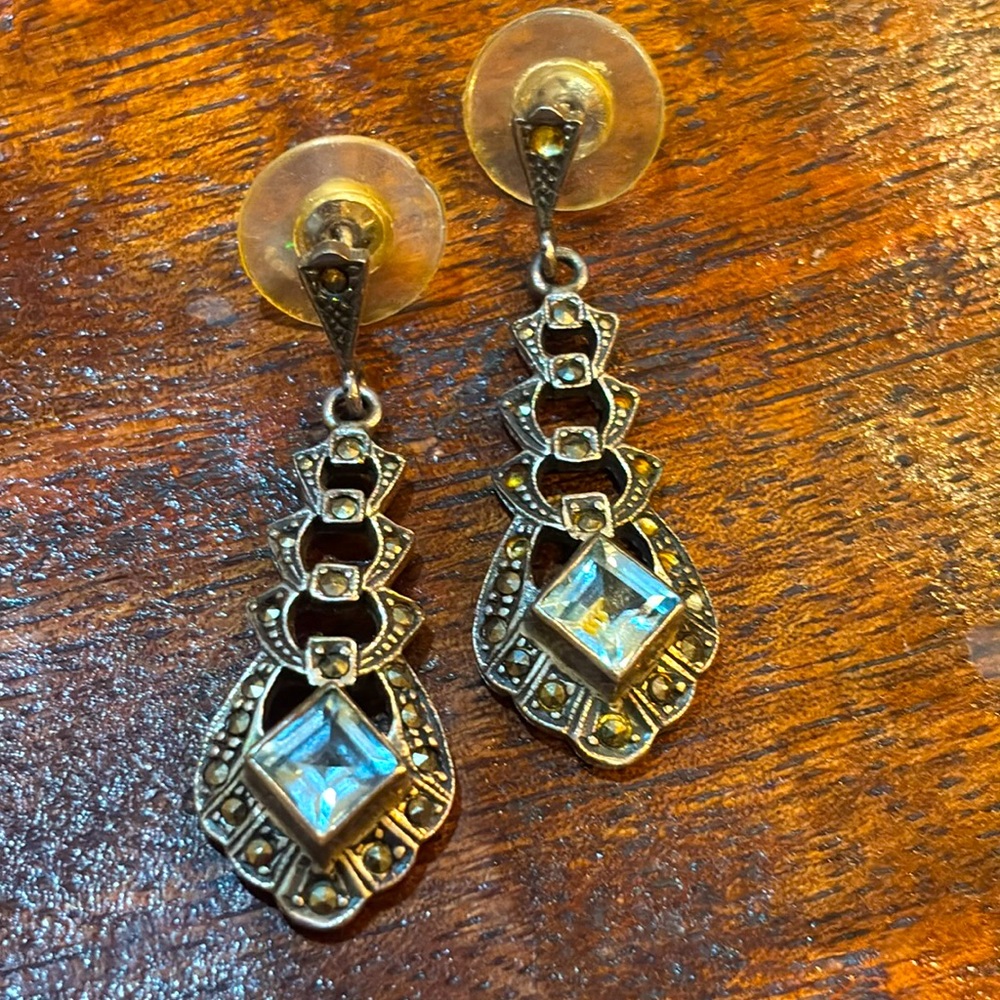 Blue sapphire dangling silver (925) earrings.